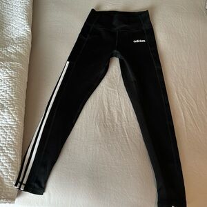 Adidas leggings, size small, black with white stripes. Phone pocket
